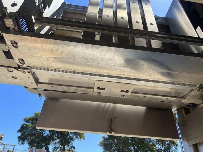 product-1-260 Lower discharge and conveyor interface beneath the lemon slicer